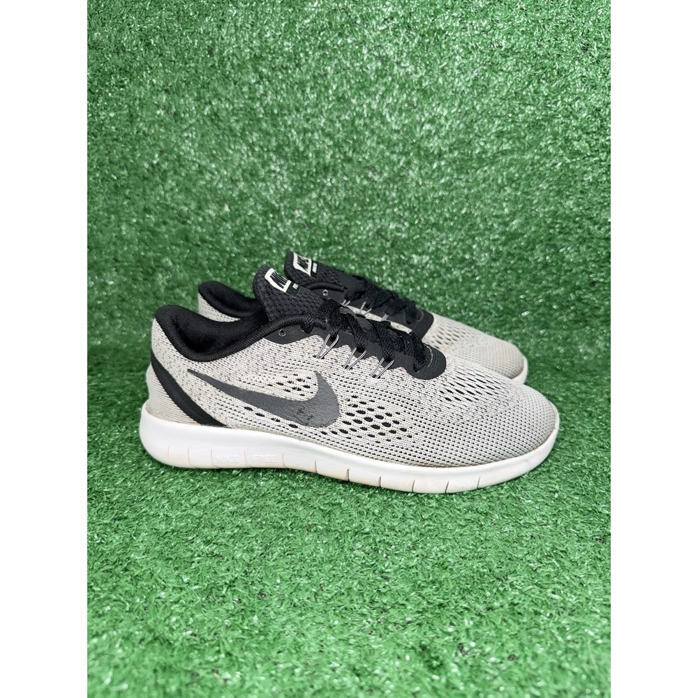 Nike Free RN Women's Size 7 Boy's 5.5 Black White Running Shoes Athletic Sneaker